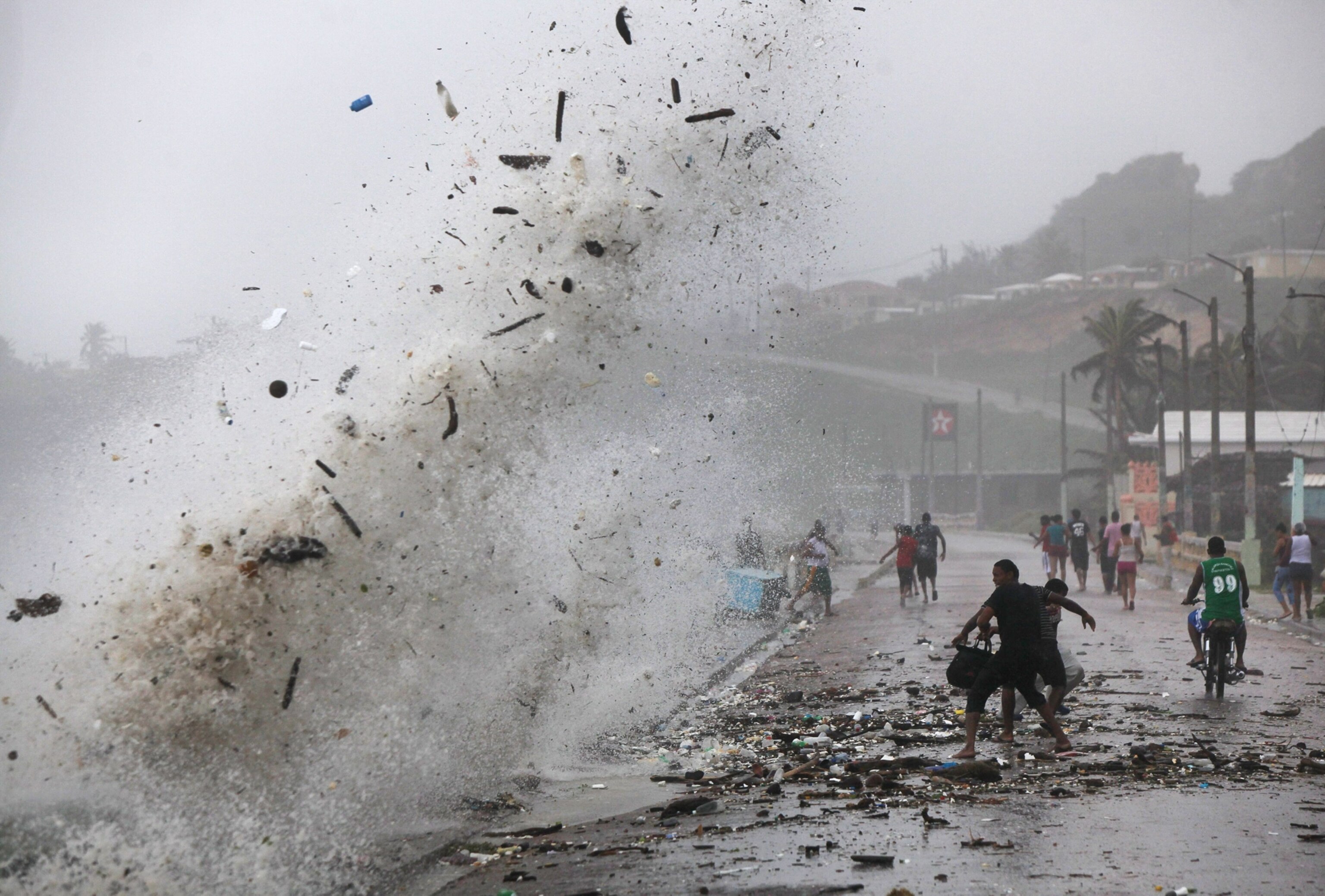A wave from Isaac hits the shore in Enriquillo, Dominican Republic.