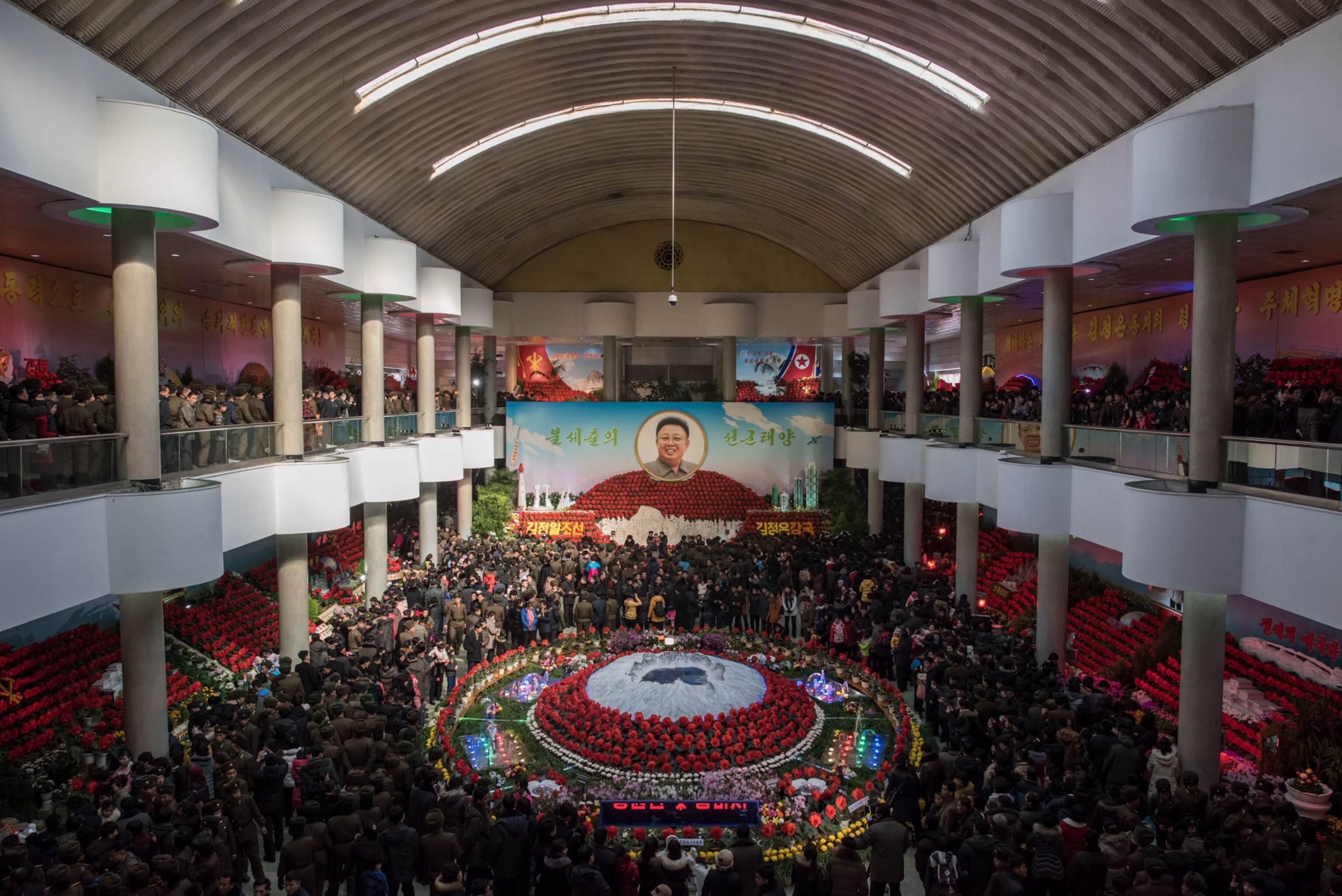 gathering of people at a flower show in North Korea