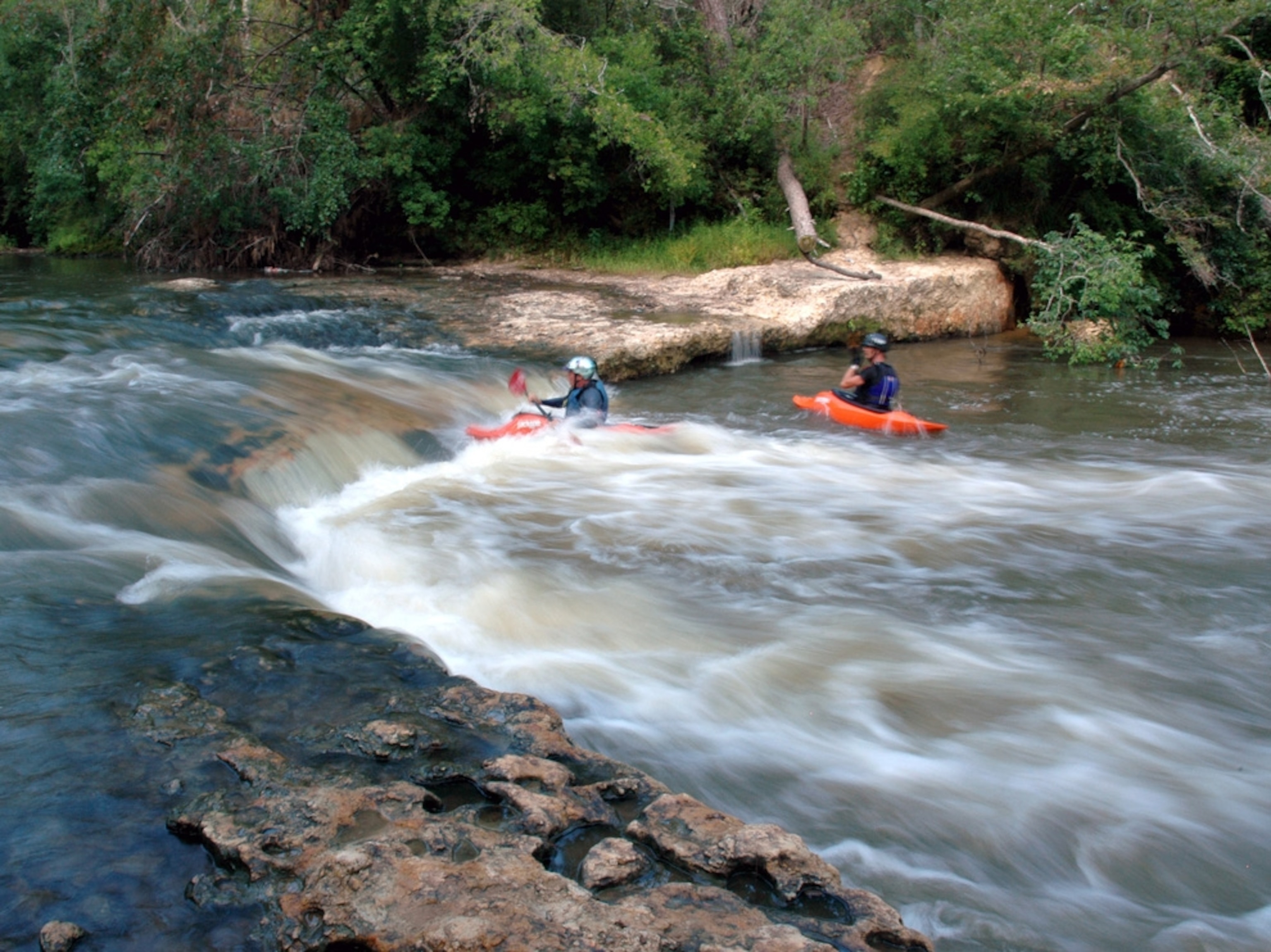 Kayaking river rapids