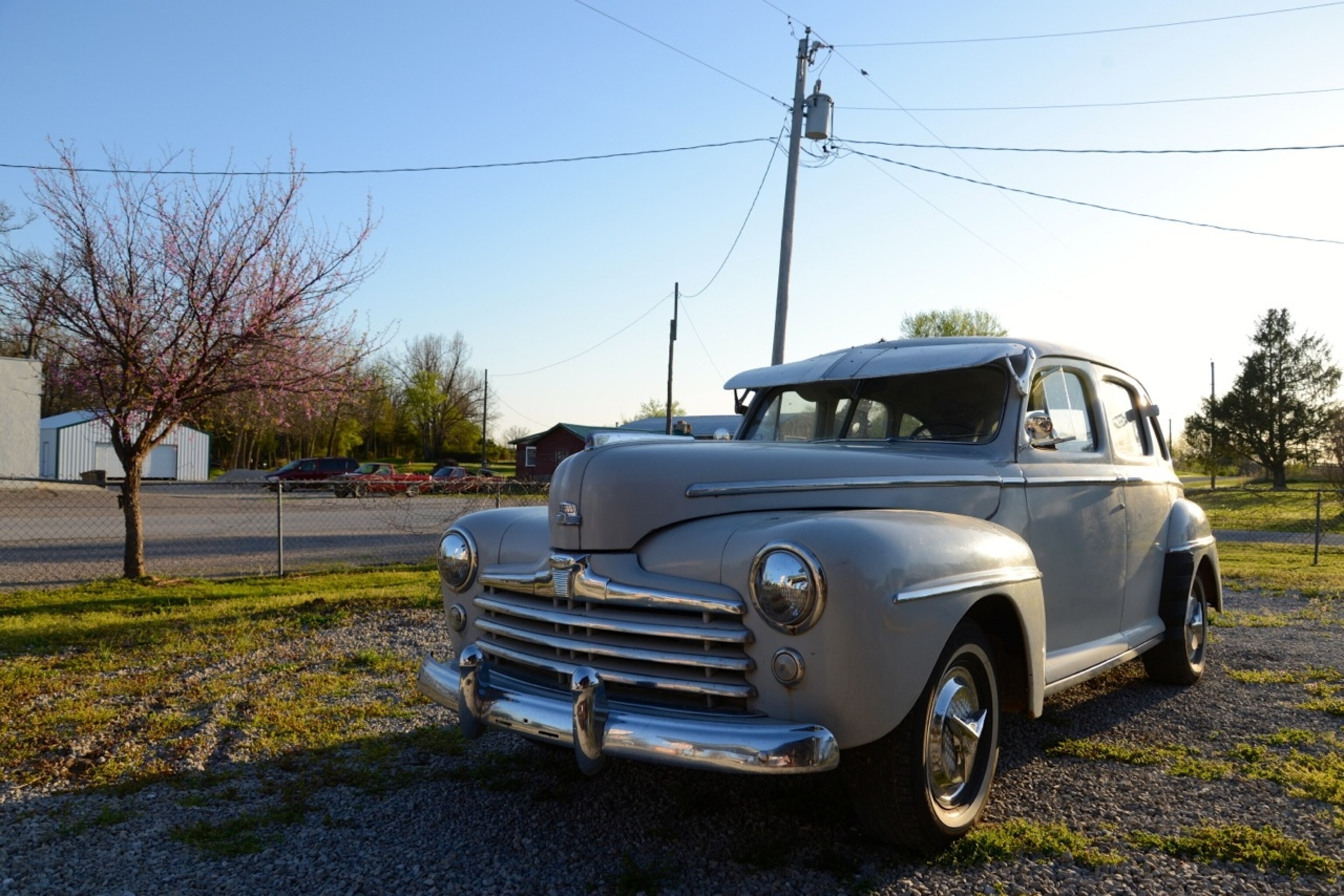 A 1941 Ford sits outside Gay Parita gas station on Route 66. (Photo by Andrew Evans, National Geographic Travel)