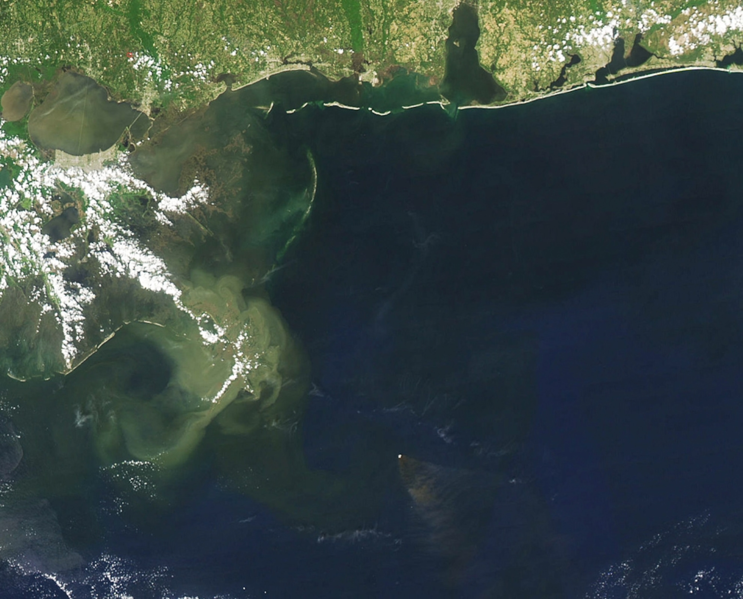 The BP-leased Deepwater Horizon oil rig, cause of the 2010 Gulf of Mexico oil spill, is seen burning in a satellite picture from April 2.