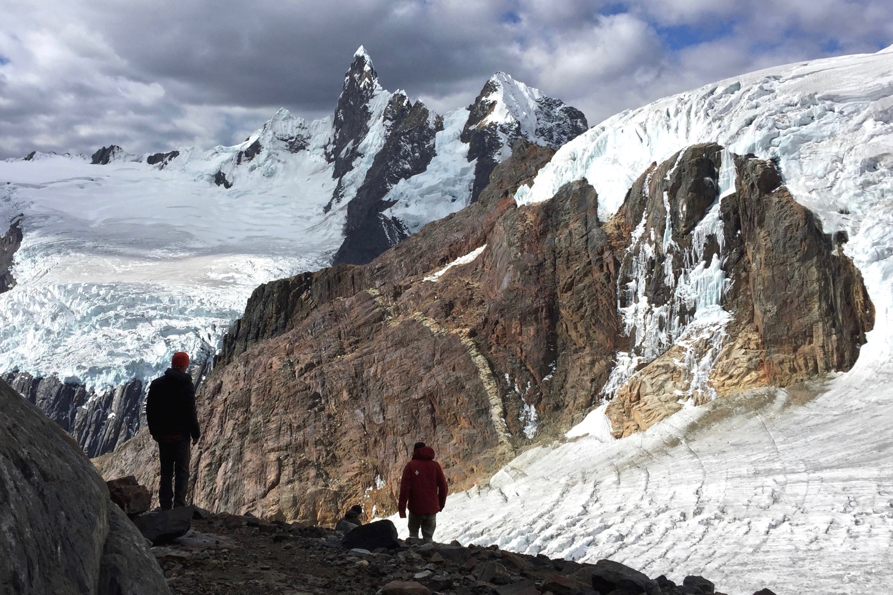 students near a glacier in the Peruvian Andes