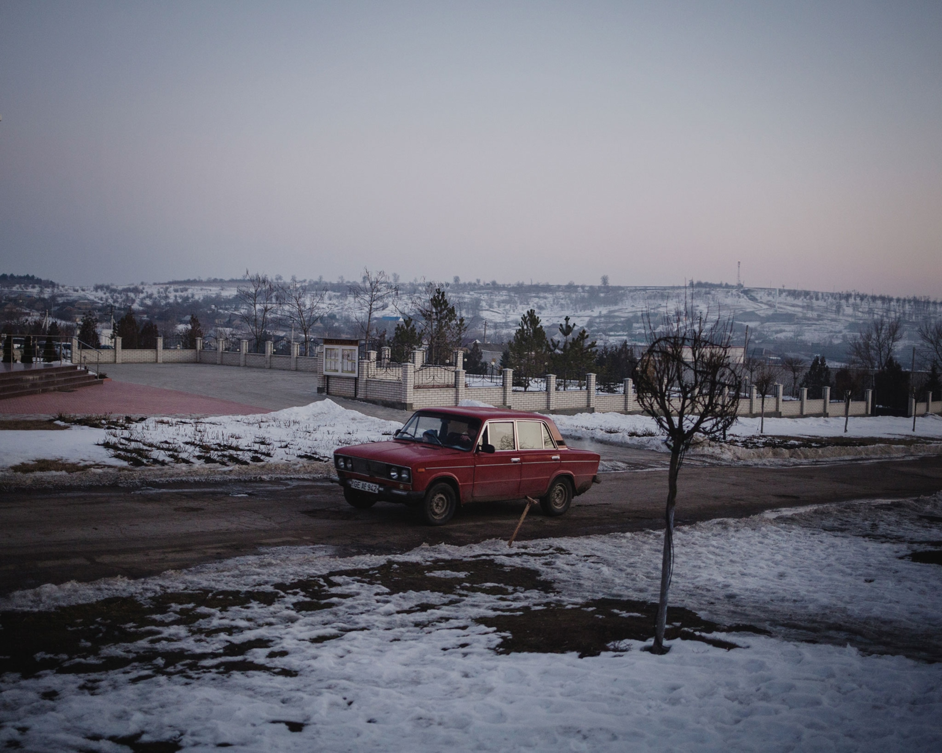 a car driving down a street
