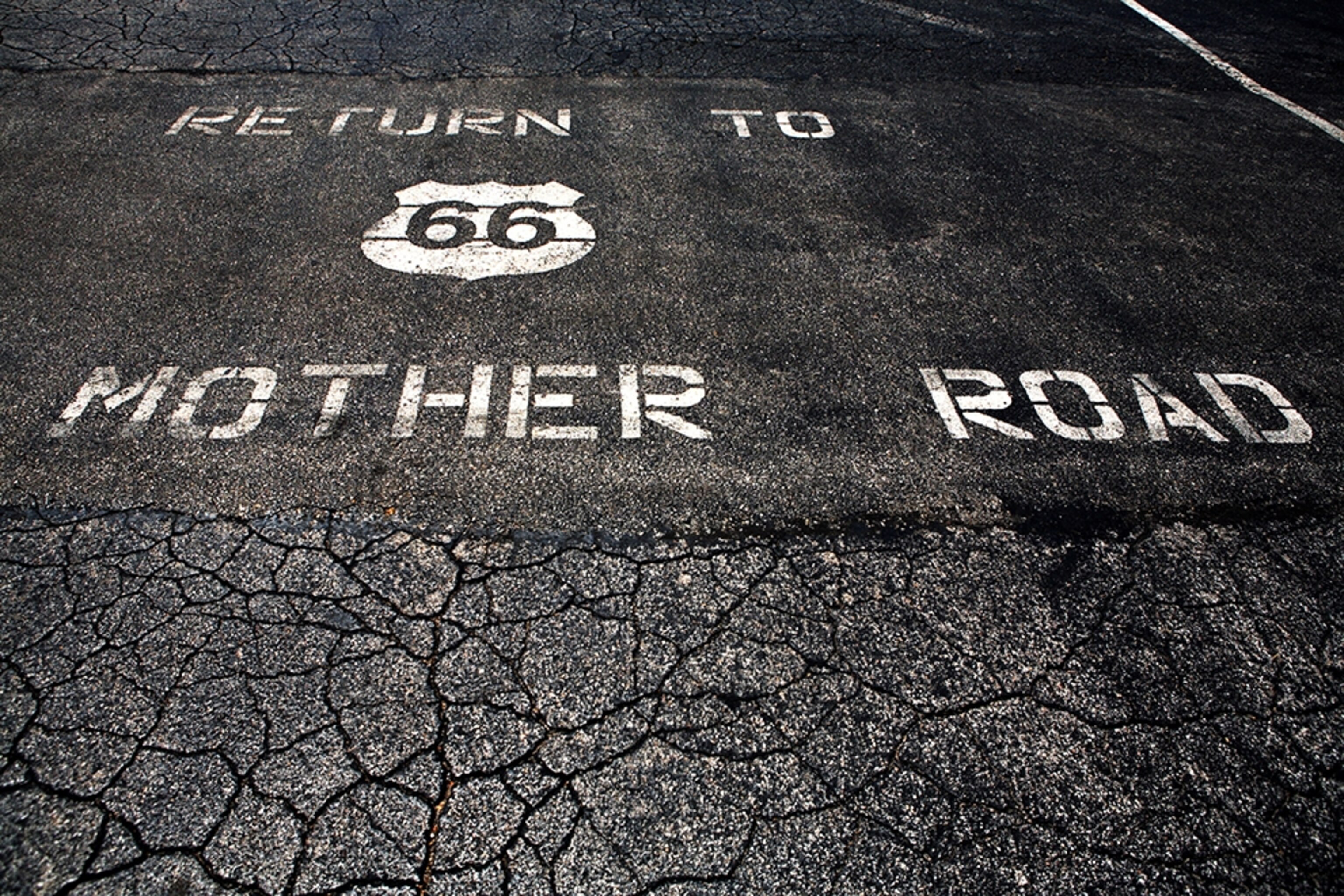 "return to mother road" sign on Route 66