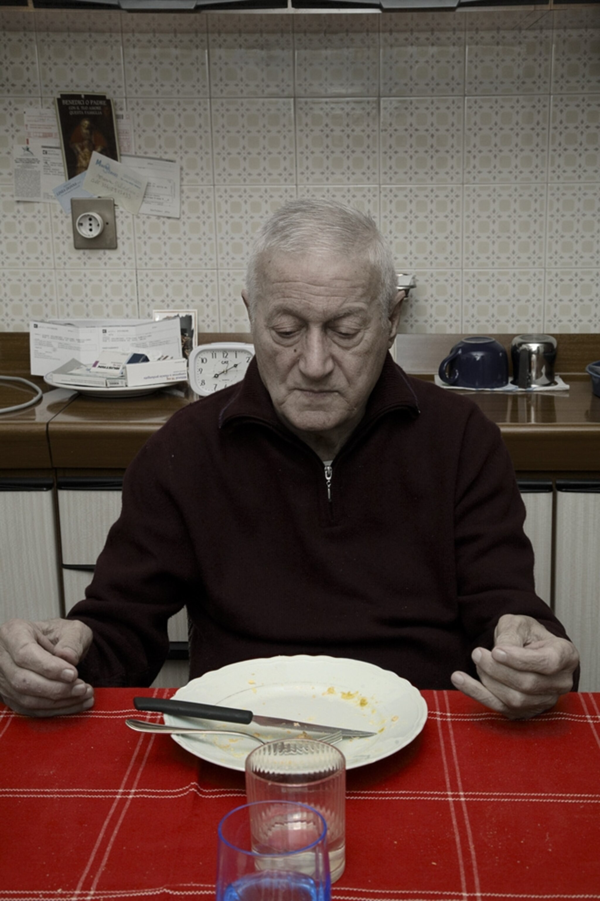 a man eating at a table: best "Portraiture" photo series, World Photography Awards 2011