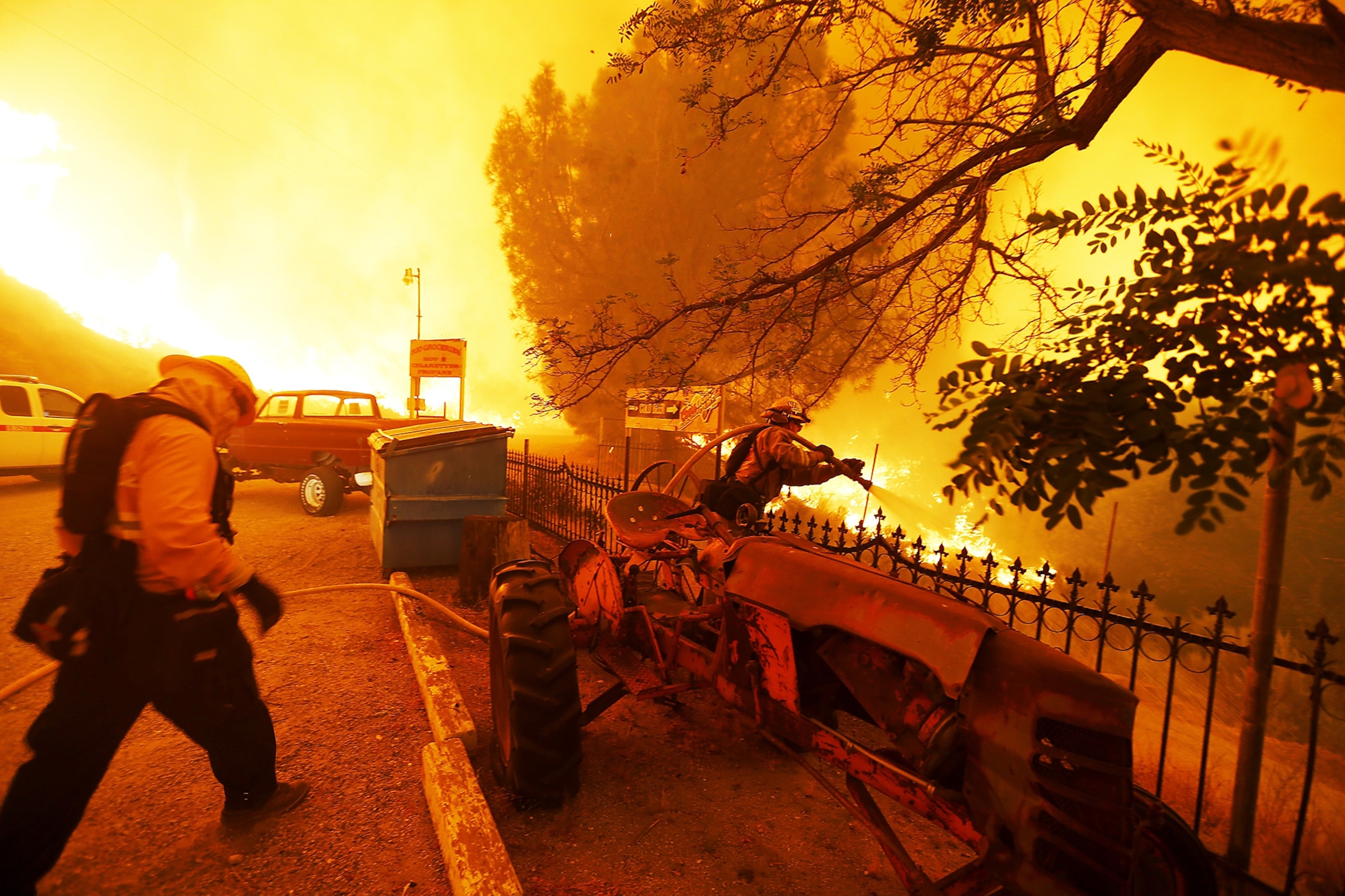 firefighters battling the Sand Fire as it burns out of control.
