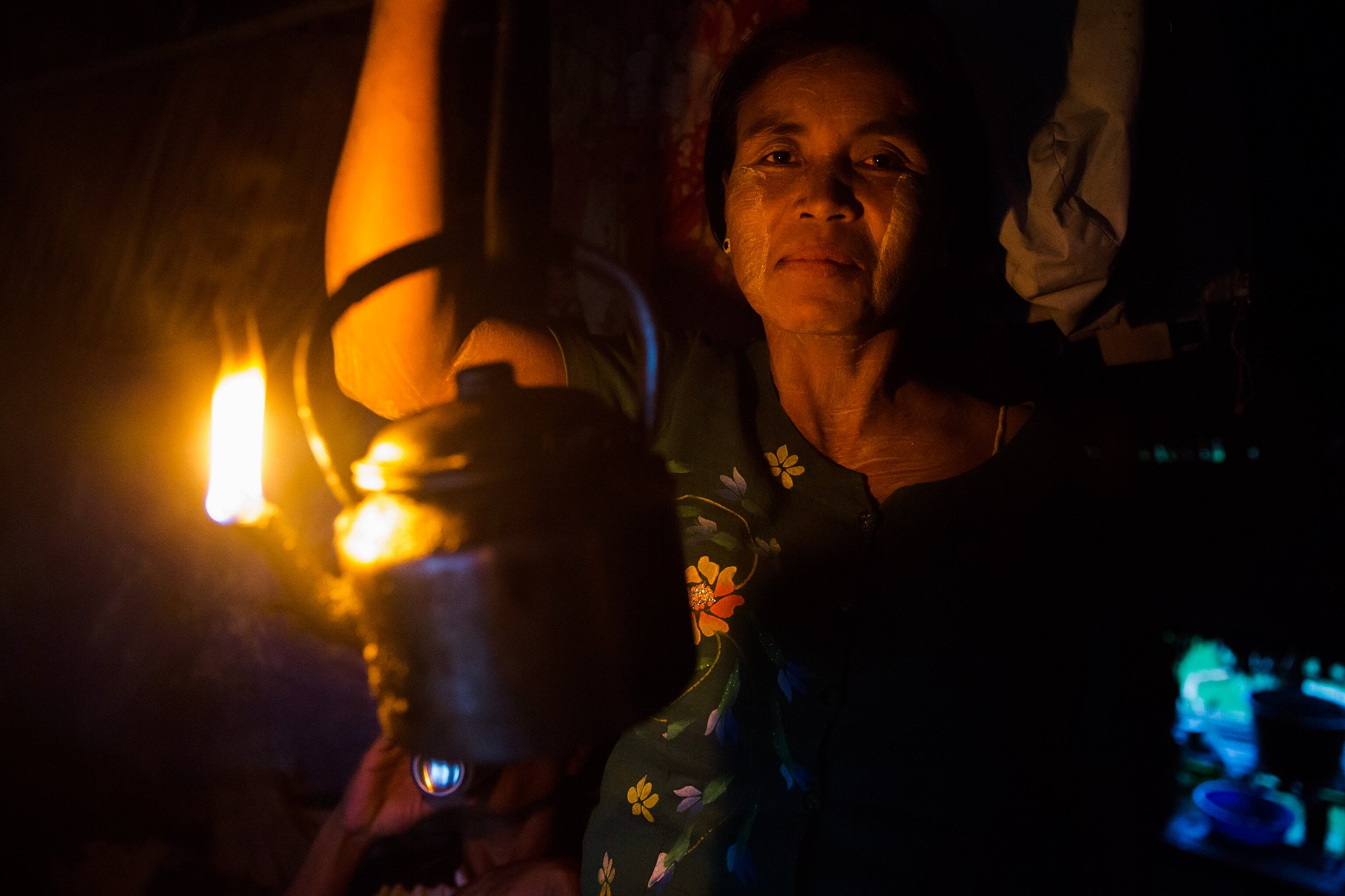 a boatman steering through a mangrove swamp near the start of a 1,500 mile oil pipeline from the Bay of Bengal to China's Yunan province.