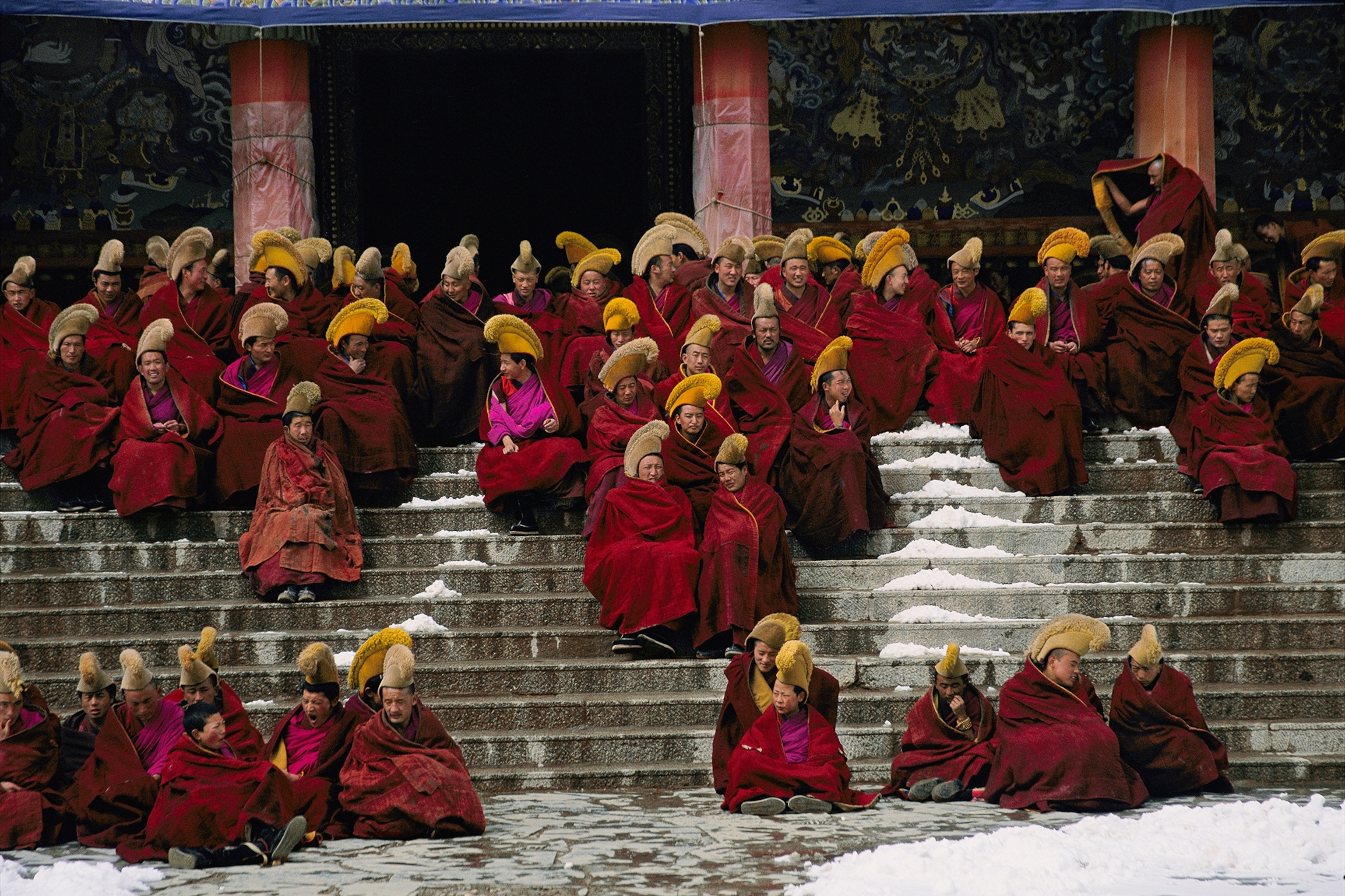 Monks of the Yellow Hat sect of Tibetan Buddhism gather for prayers.