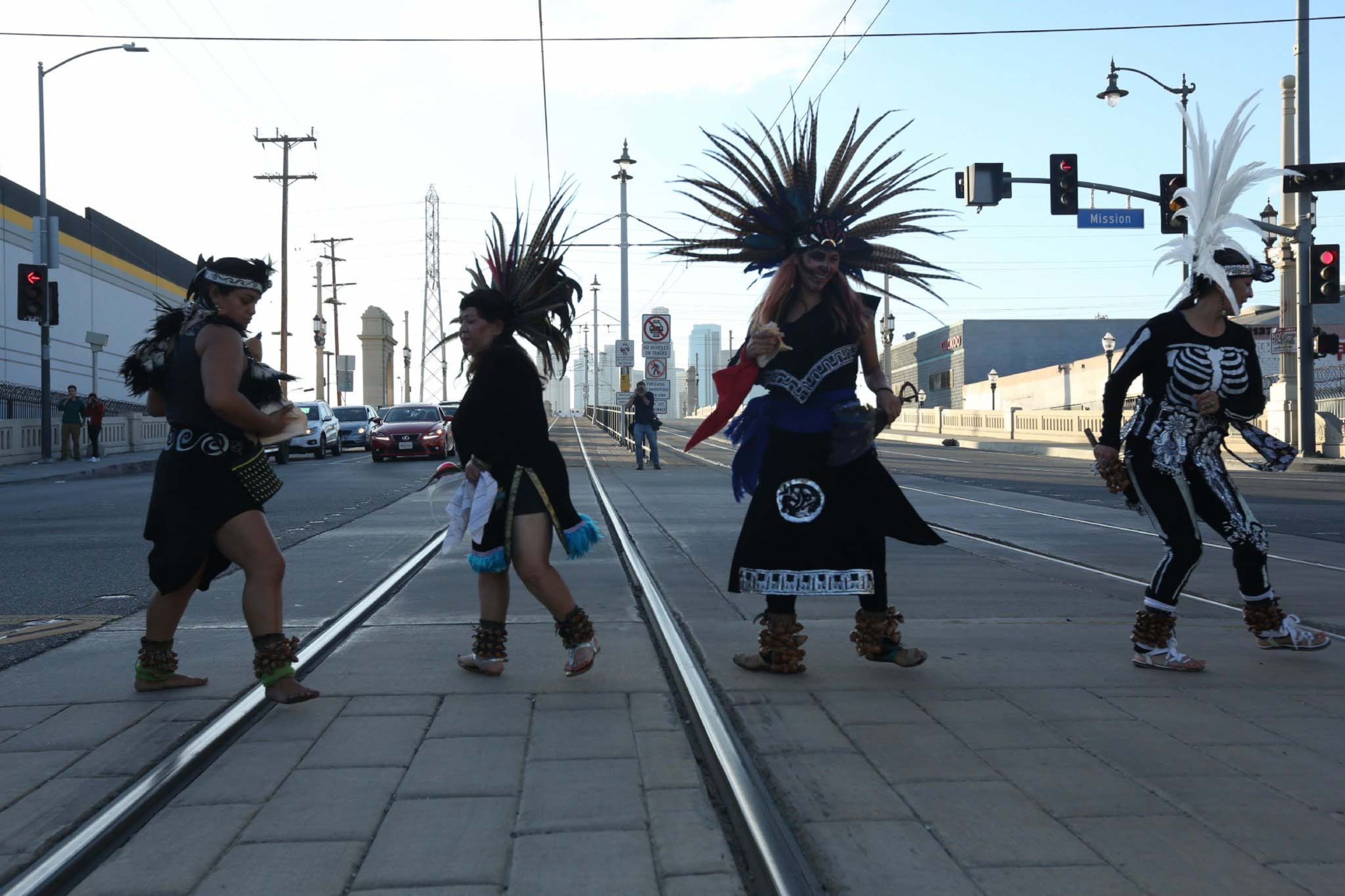Aztez dancer participate in a day of the dead celebration in LA