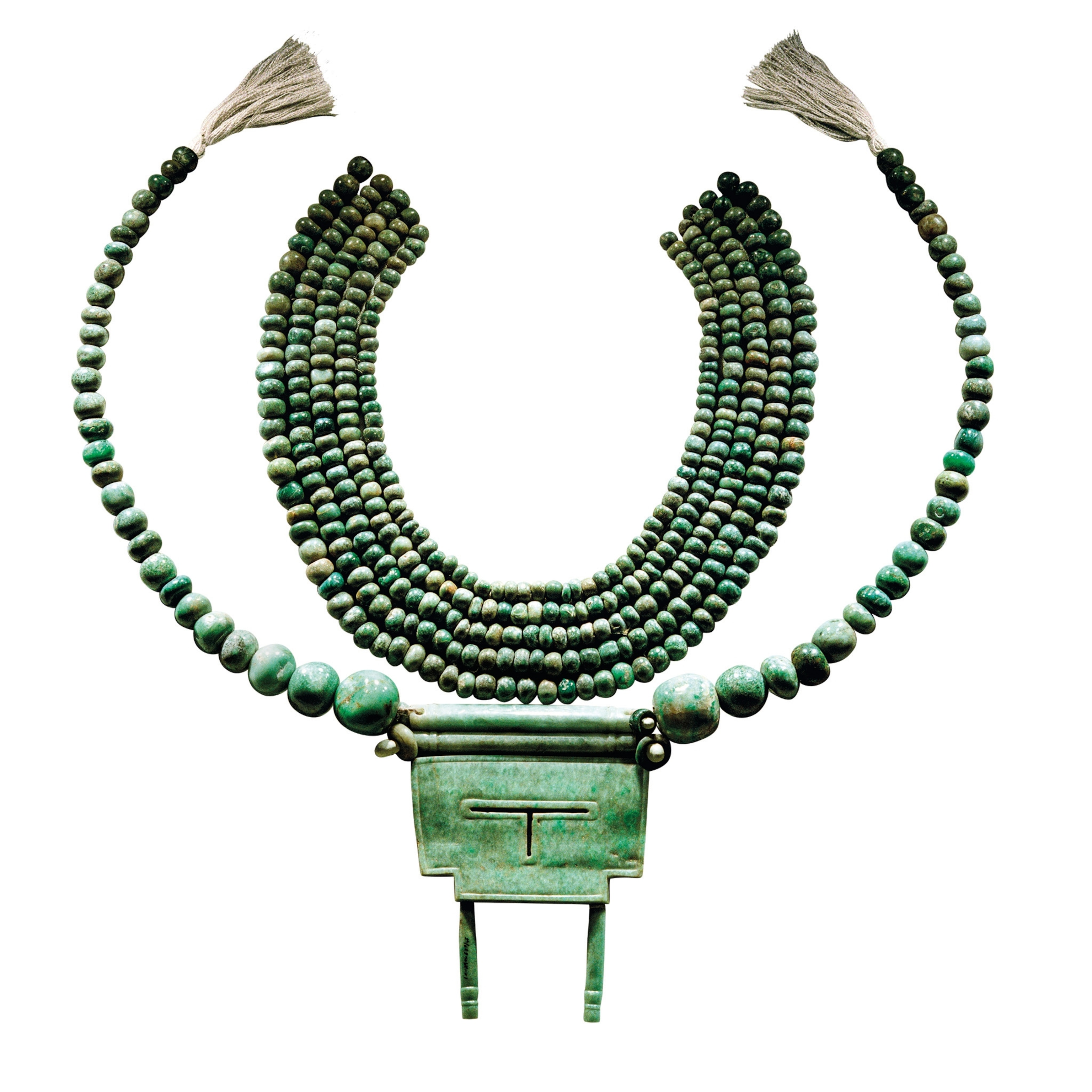 A jade pectoral, an object from other royal burials at Calakmul, is pictured.