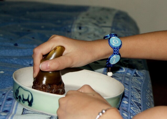 POLL: Can Fake Rhino Horn Stop the Poaching of an Endangered Species? A woman grinds rhino horn on a ceramic plate at her home in Hanoi, Vietnam. Many Vietnamese say rhino horn has medicinal value and can cure anything from hangovers to cancer. There’s no scientific basis for this belief. STR, AFP, Getty Images