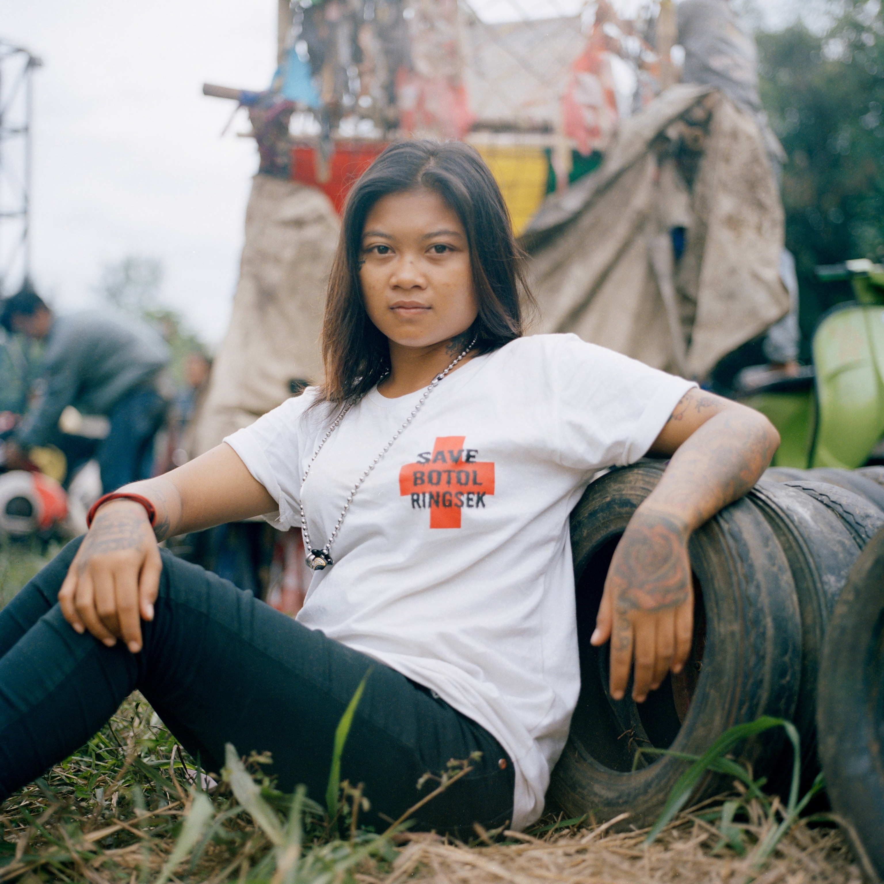 a female scooter enthusiast at a vespa meet up in Indonesia