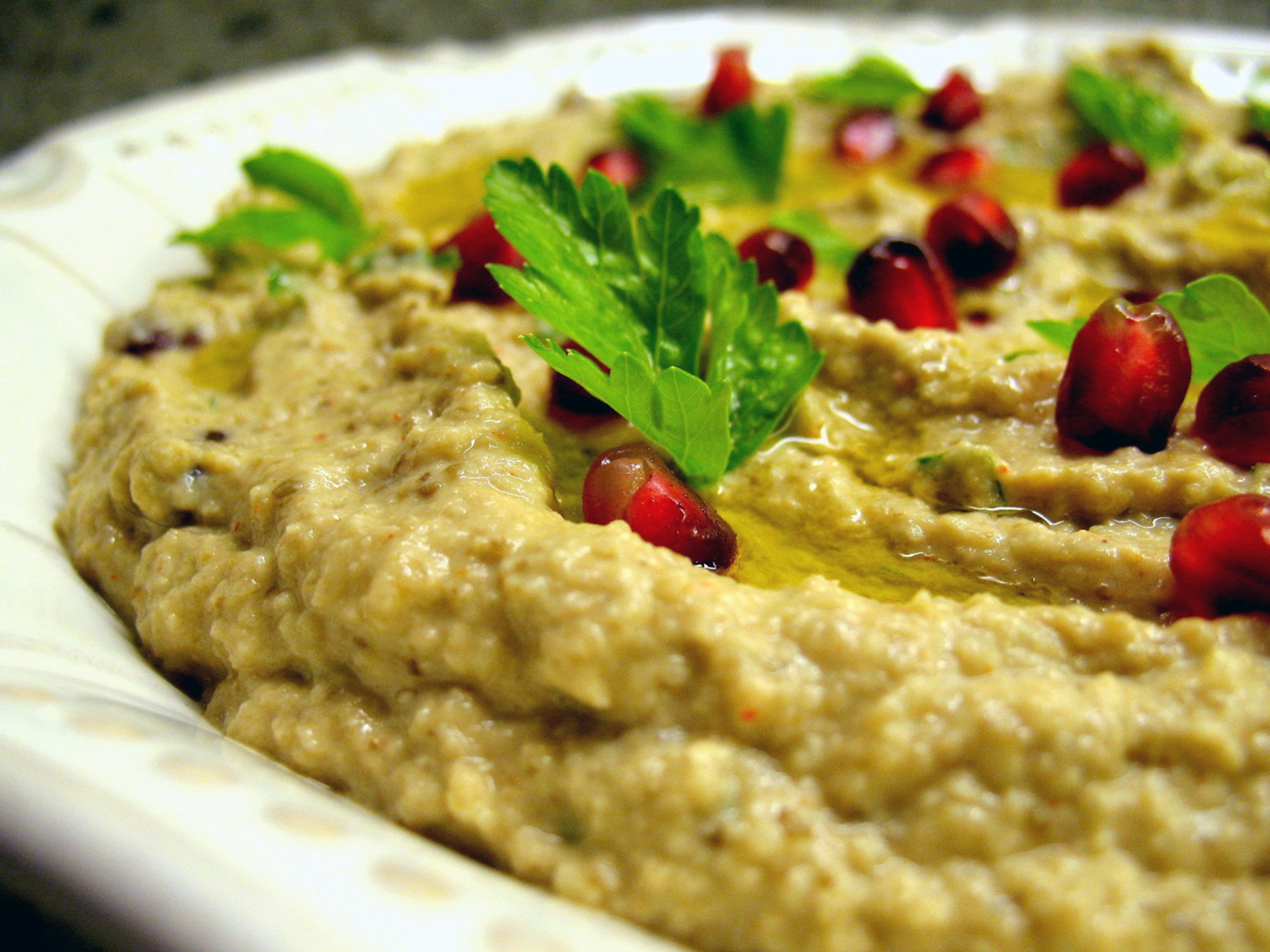 Baba ghanoush, a dish made of fire-roasted eggplant that's puréed and mixed with tahini and lemon juice. Photograph Courtesy of Alameer
