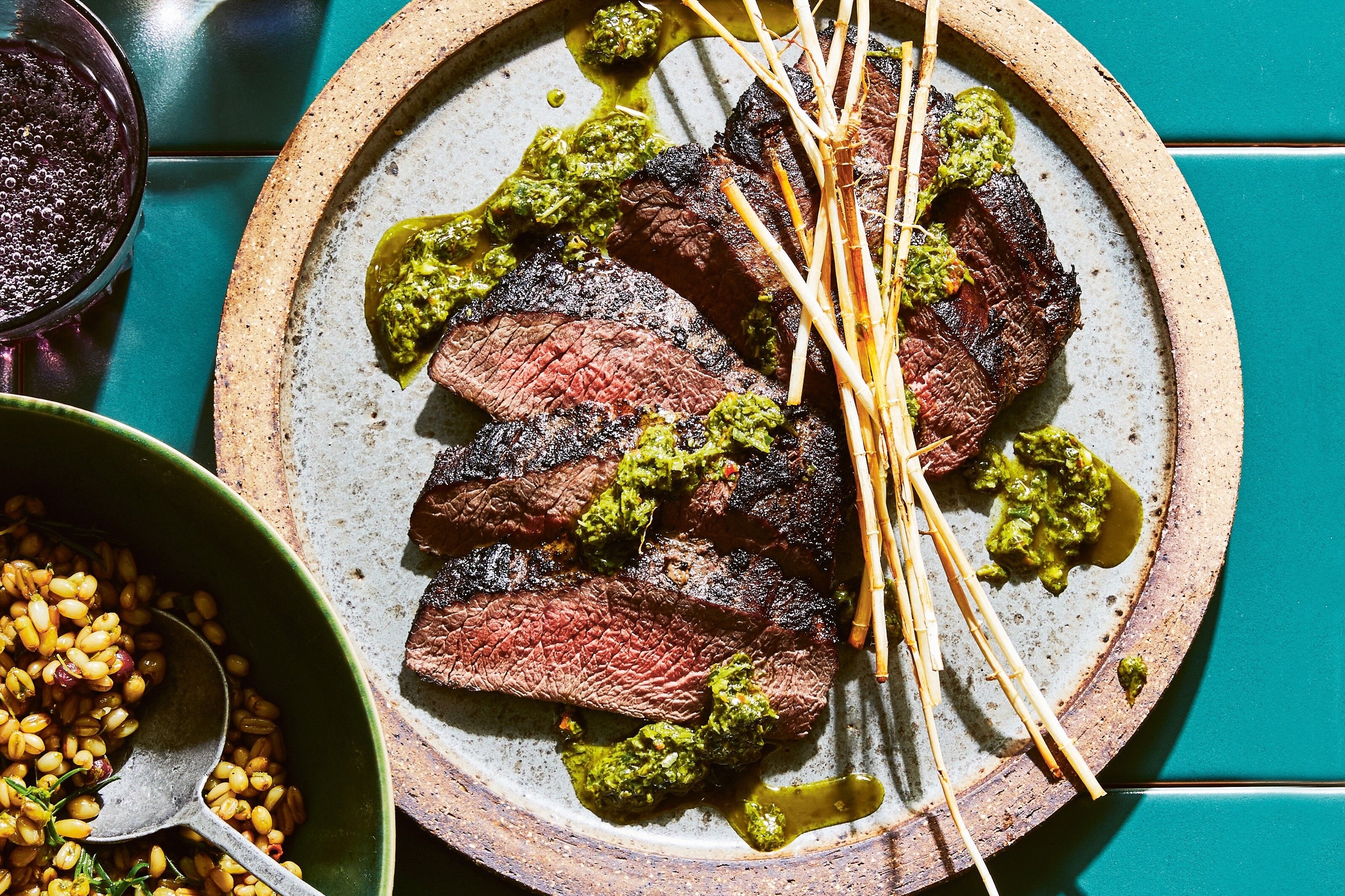 Barbecued emu marinated in molasses, served with chimichurri.