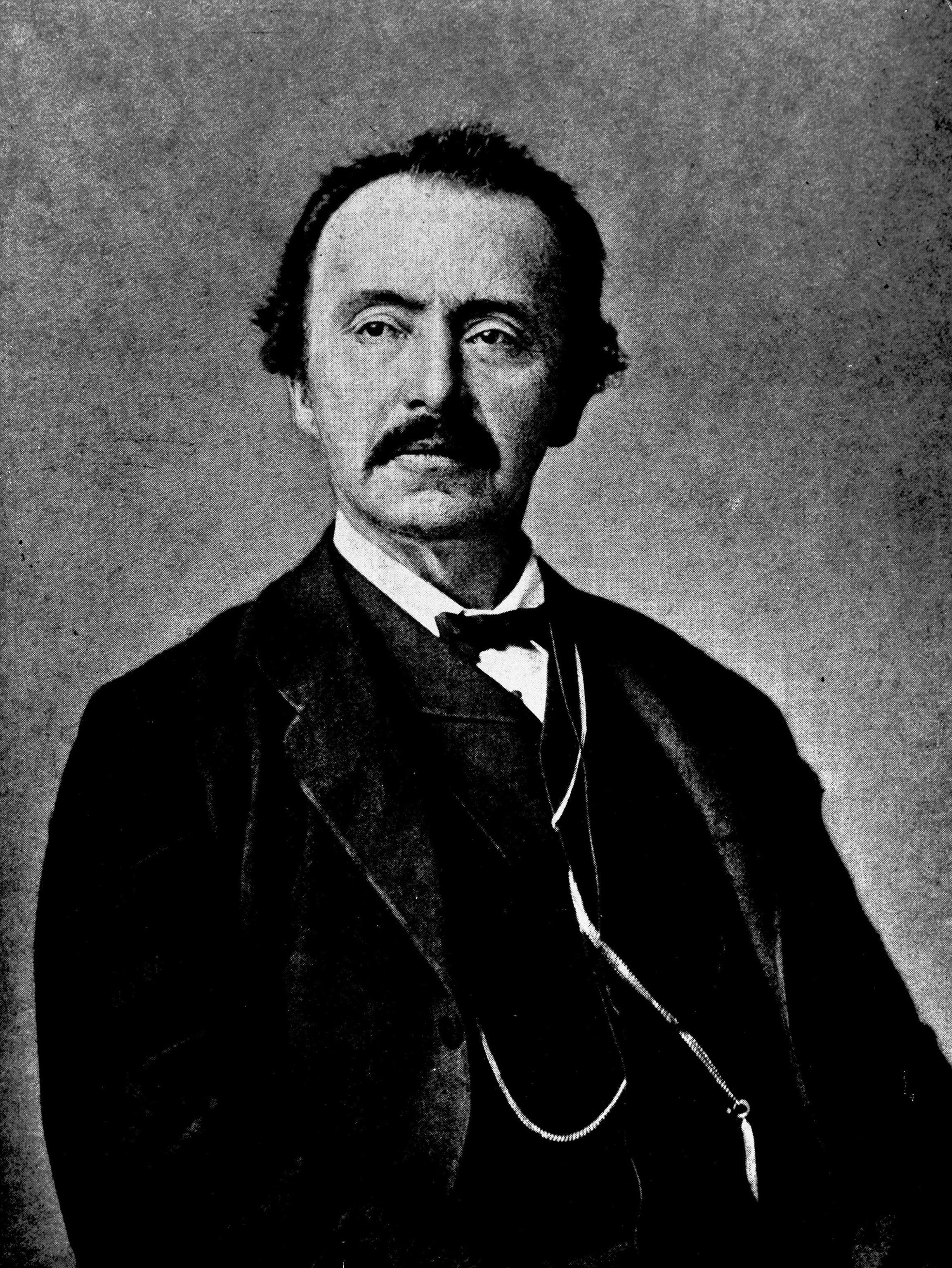 Black and white portrait of Heinrich Schliemann.